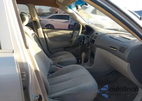 2000 Toyota Corolla Ce z USA, uszkodzony, nr VIN 2T1BR12E6YC323712